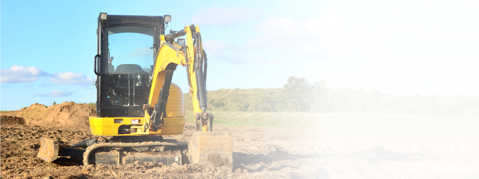 mini excavator for land clearing